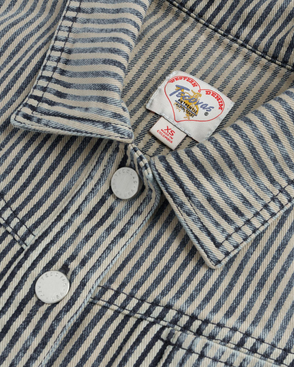 Closeup detail view of Women's S/S Denim Top - Blue / White