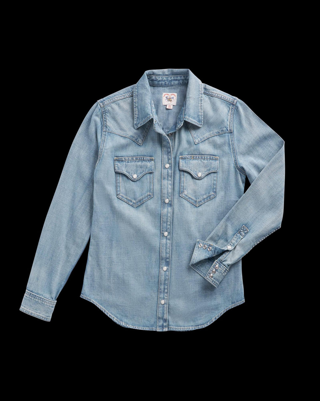 Light blue denim long-sleeve shirt with snap buttons, two front chest pockets, and pointed collar, displayed on a plain background.