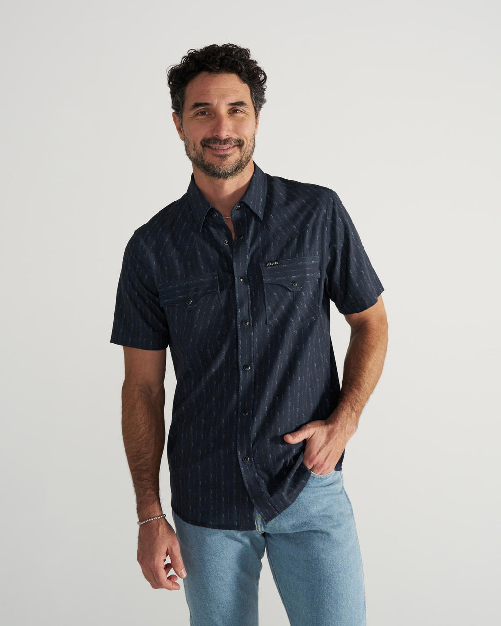 Closeup detail view of Men's Performance Western Short Sleeve Pearl Snap - Dark Navy/Multi