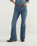 Front view of Women's Mid-Rise Slim Flare - Medium Wash on model