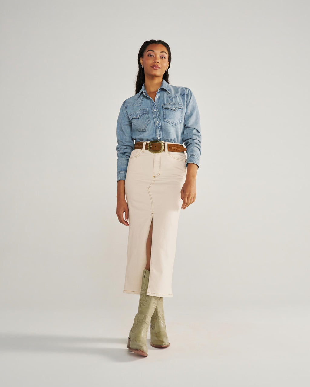 Closeup detail view of Women's Denim Pearl Snap - Light Wash
