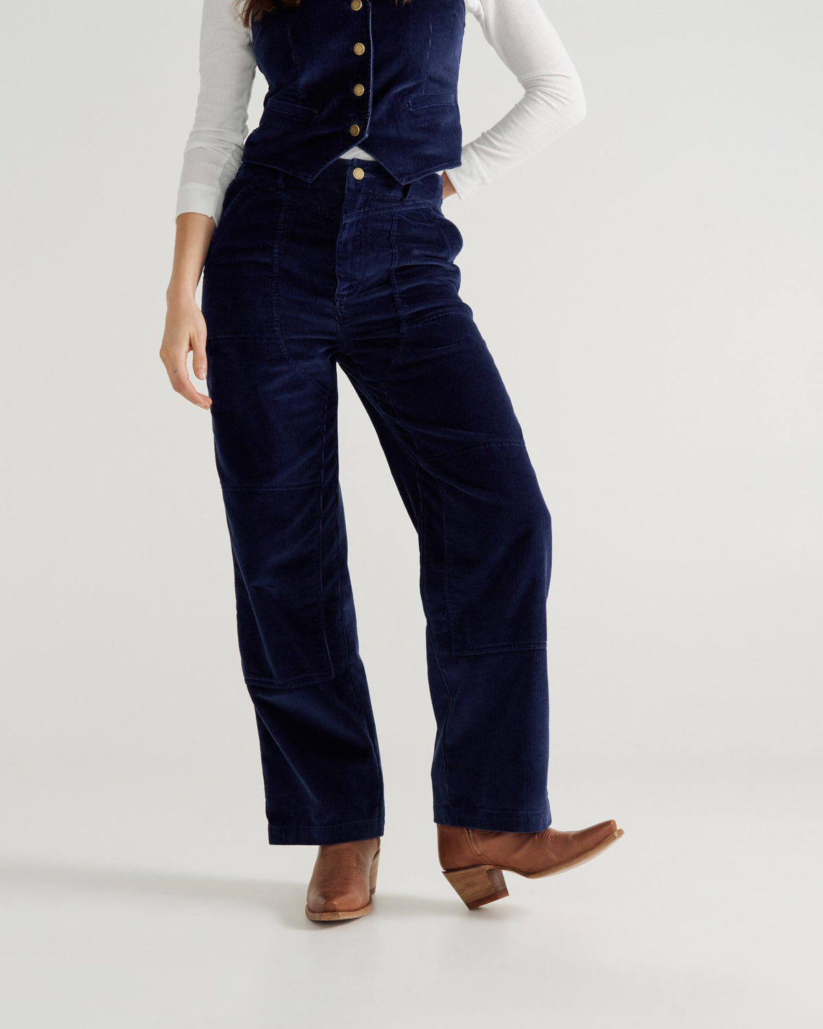 Front view of Women's Corduroy Carpenter Pant - Navy on model