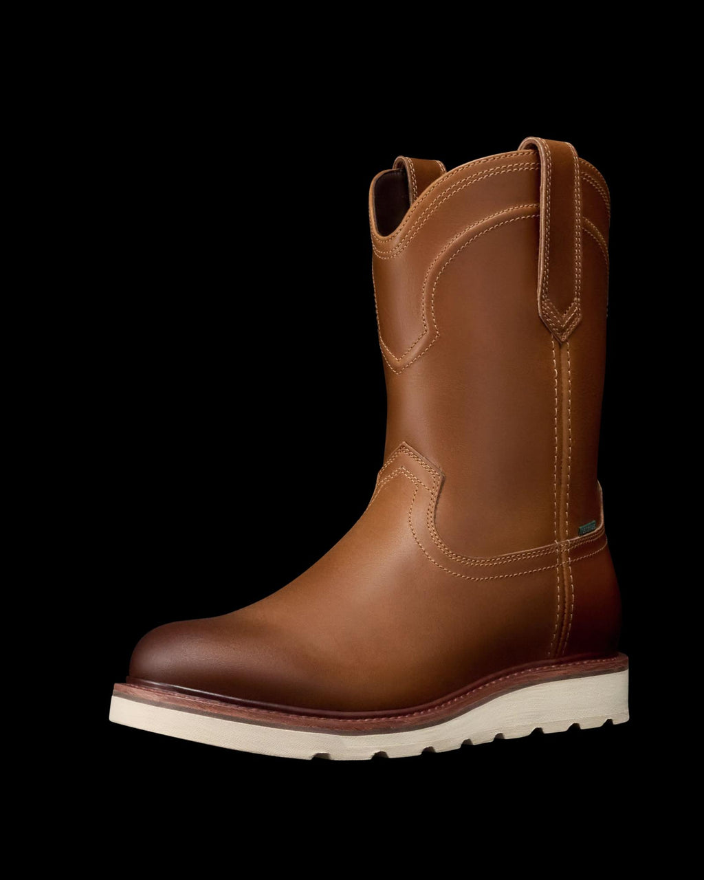 The Knox Cowhide brown leather pull-on work boot features a wheat-toned white sole, round toe, and side pull loops, displayed against a plain white background.