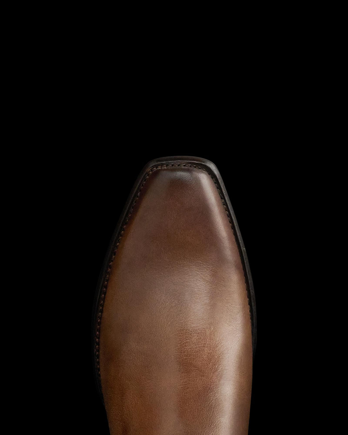 Toe view of The Warren - Vintage Tan Cowhide on plain background