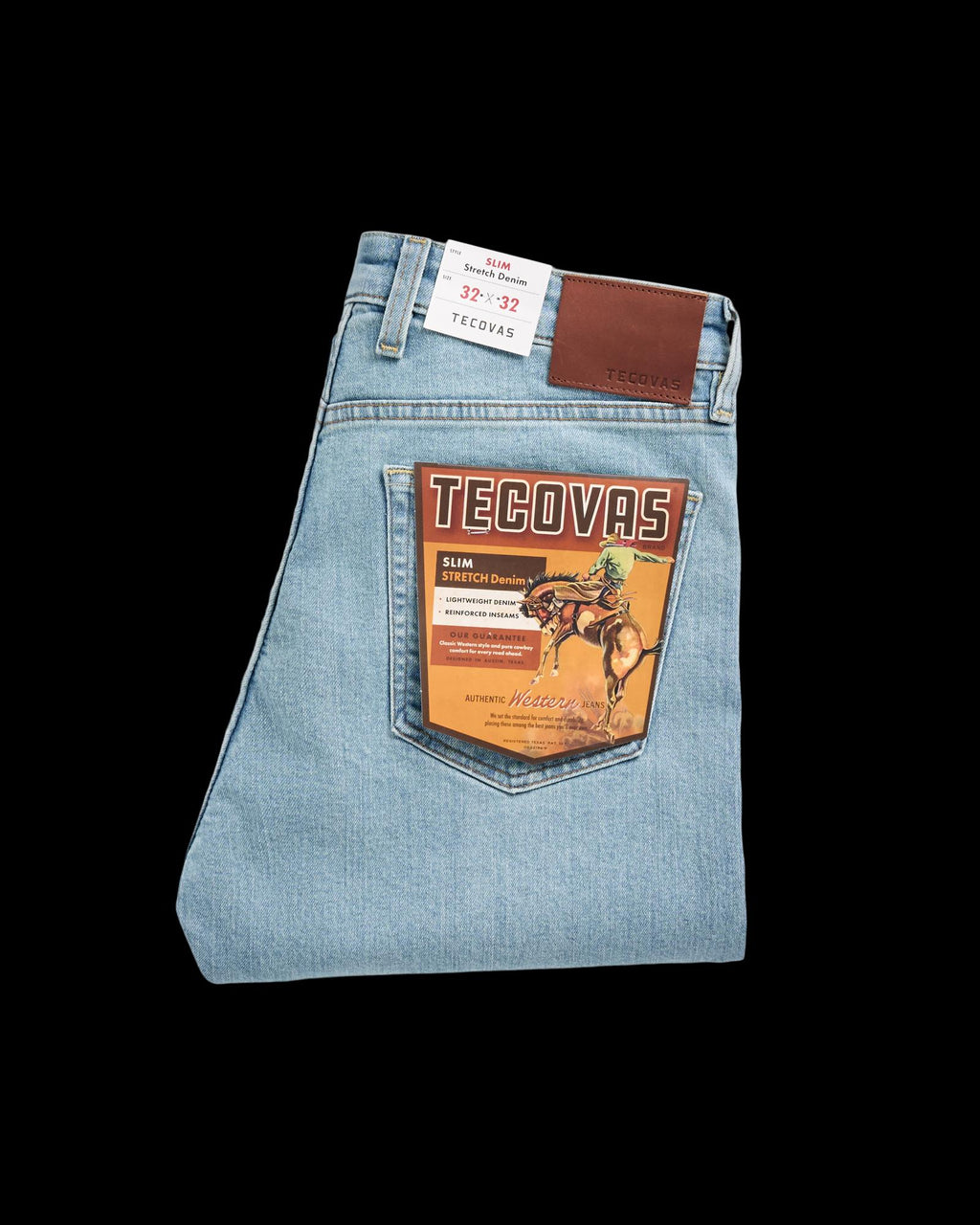Folded view of Men's Slim Stretch Denim - Light Stone Wash on plain background