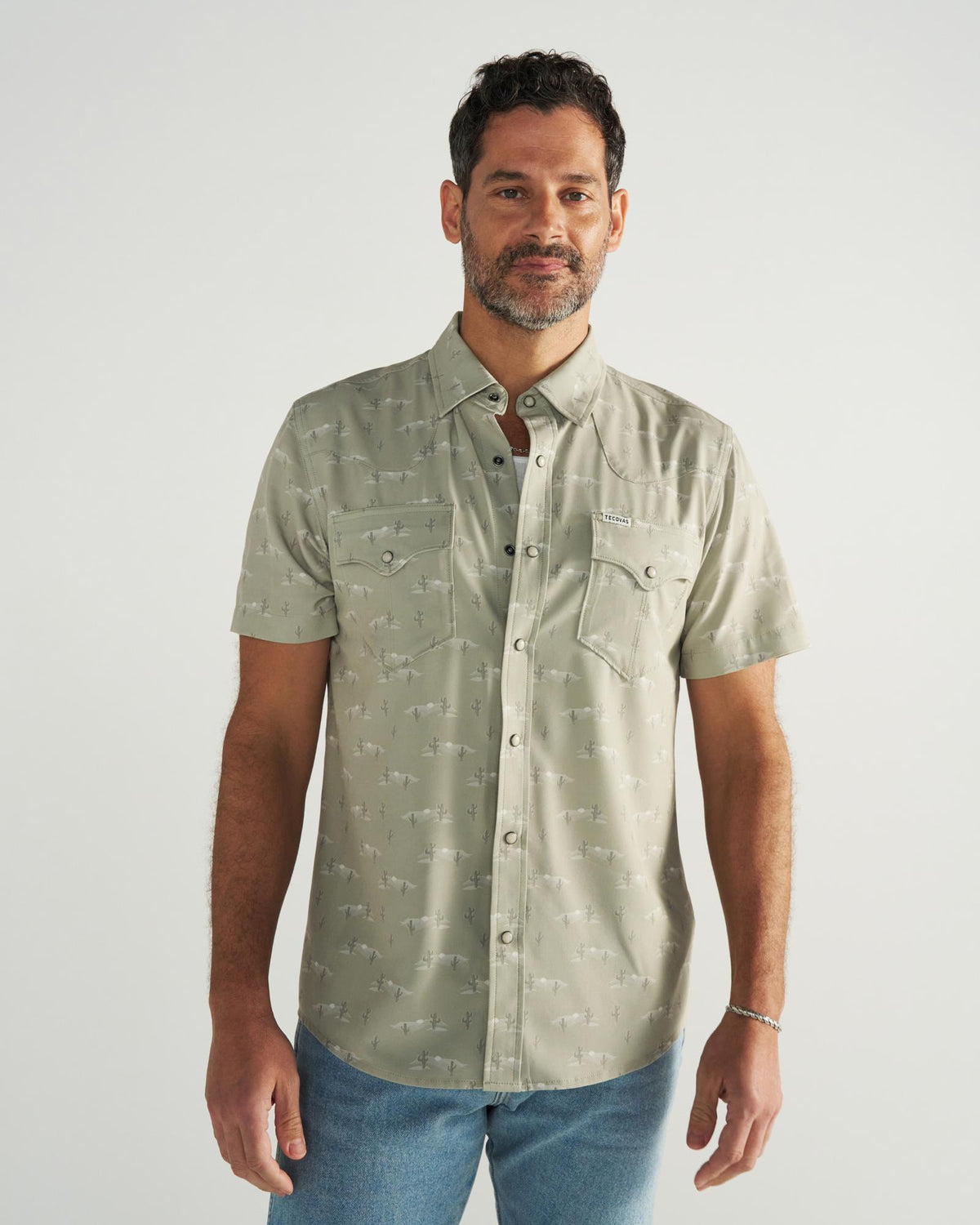 Closeup detail view of Men's Performance Western Short Sleeve Pearl Snap - Desert Sage/Light Sand