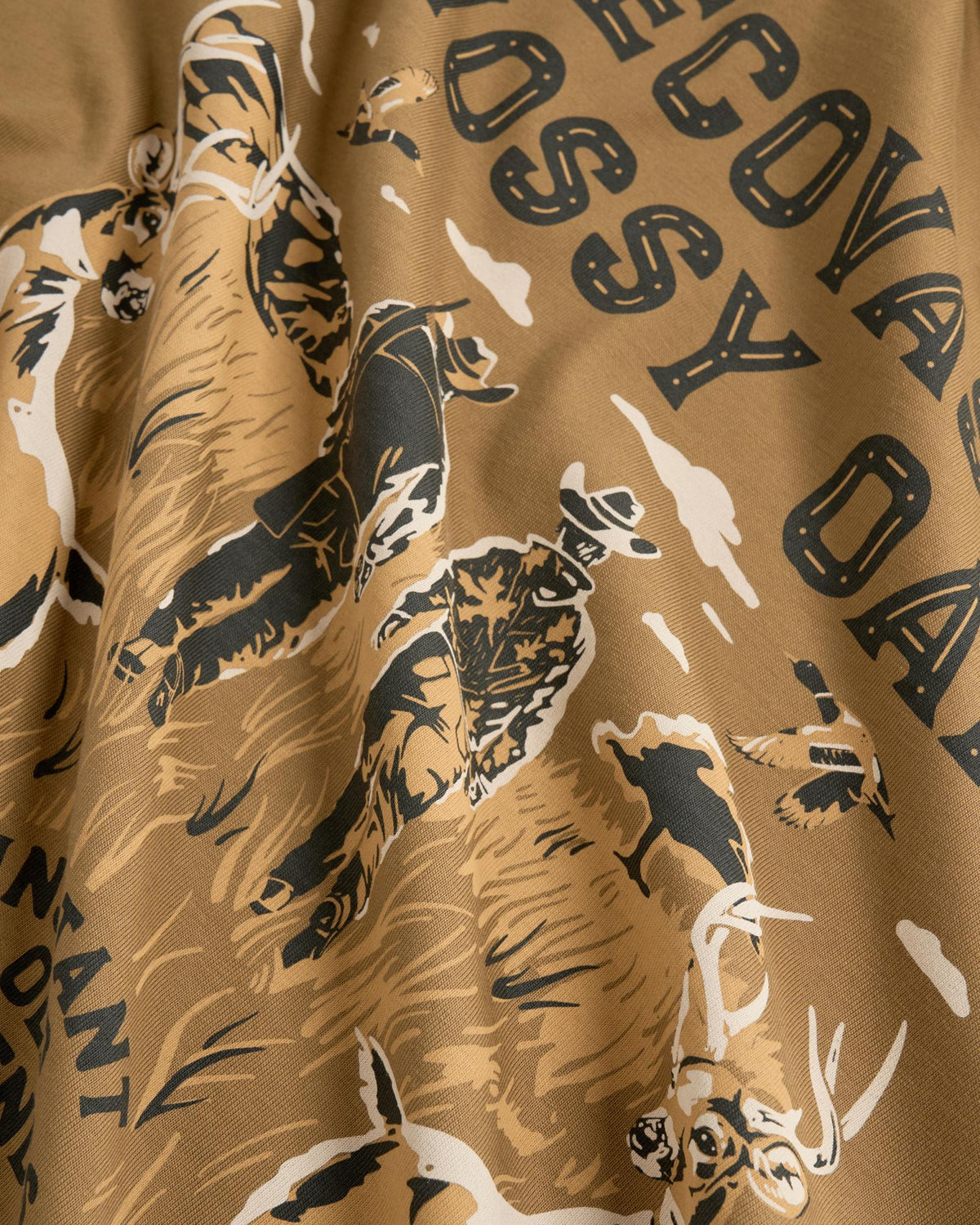 Closeup view of Men's Tecovas x Mossy Oak Cowboys & Deer T-Shirt - Olivewood