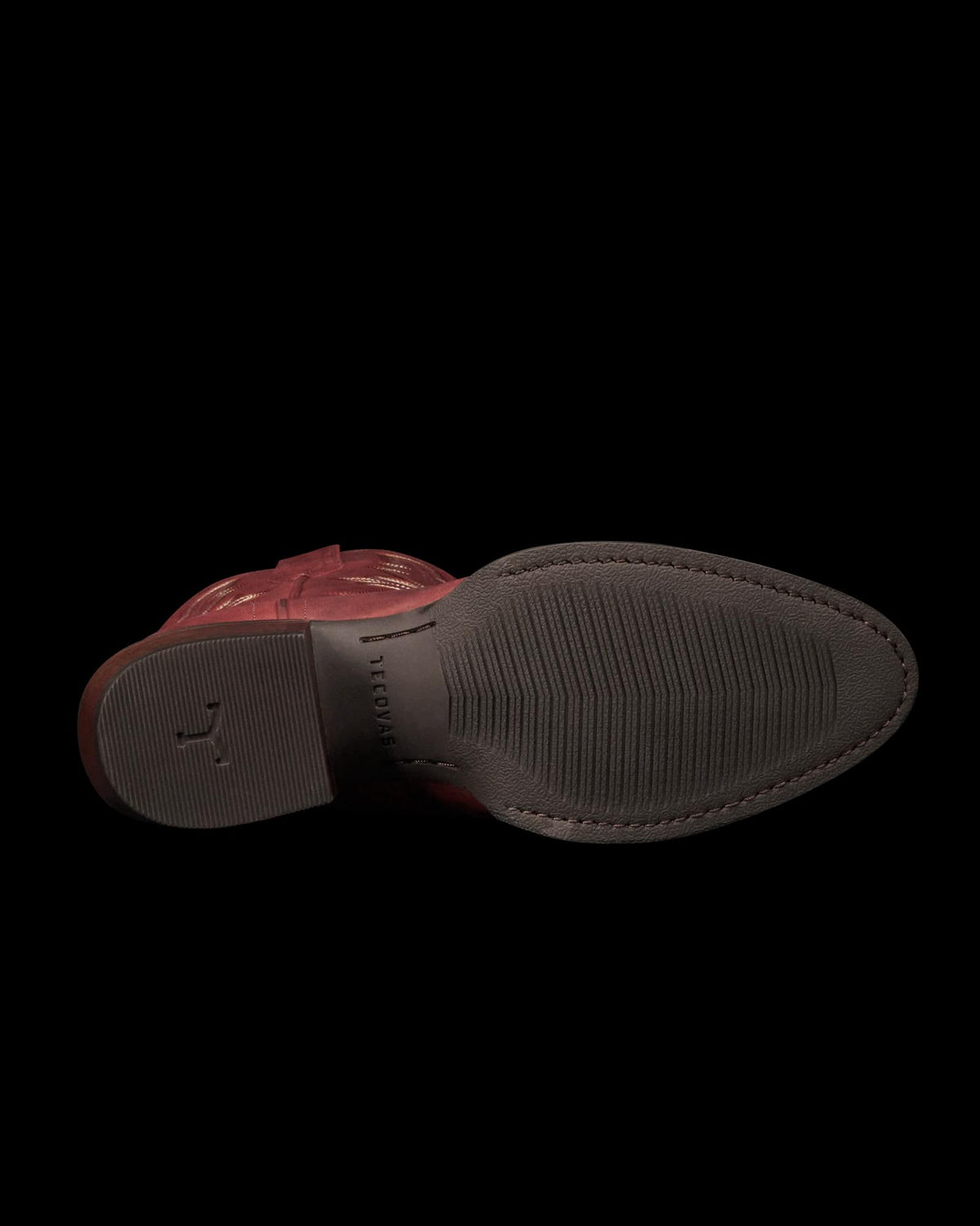 The Britt in Redwood Goat. The image shows the bottom view of a brown Redwood Goat dress shoe with a textured rubber sole and “FLORSHEIM” inscribed near the arch.