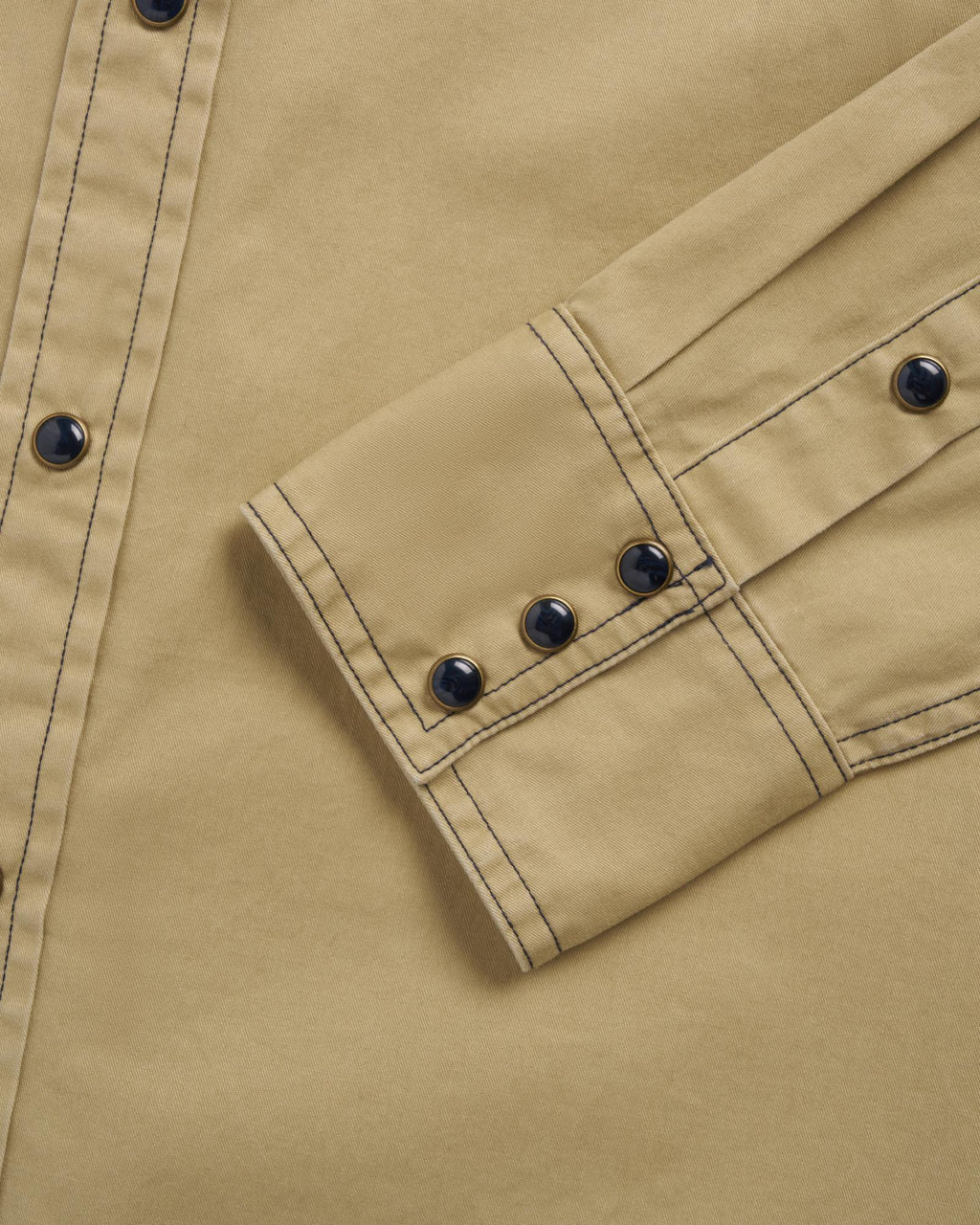 Closeup detail view of Men's Thorn Stopper Pearl Snap LS - Navy / Khaki