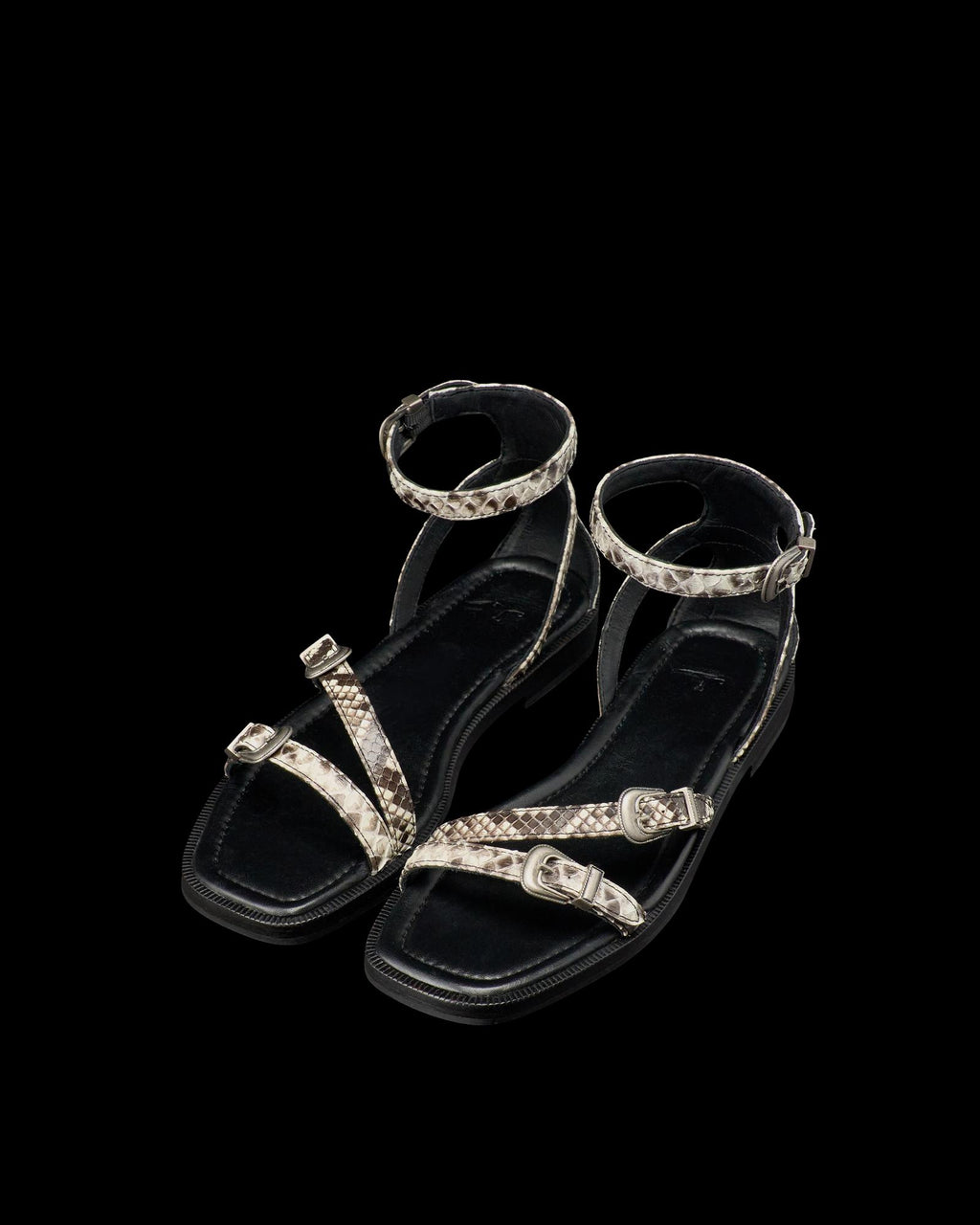 Quarterfront view of The Blakely - Black/Bone on plain background