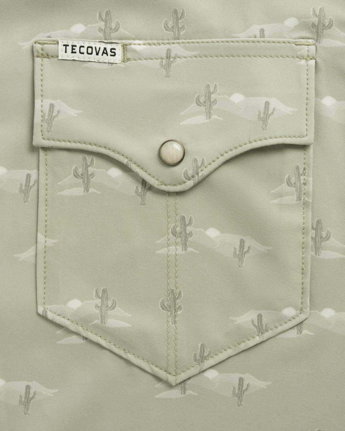 Closeup detail view of Men's Performance Western Short Sleeve Pearl Snap - Desert Sage/Light Sand