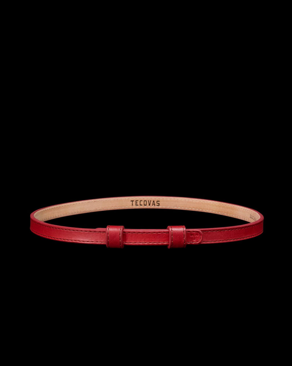 A red leather belt with a simple buckle and “Tecovas” branding on the inner side, displayed on a plain white background.
