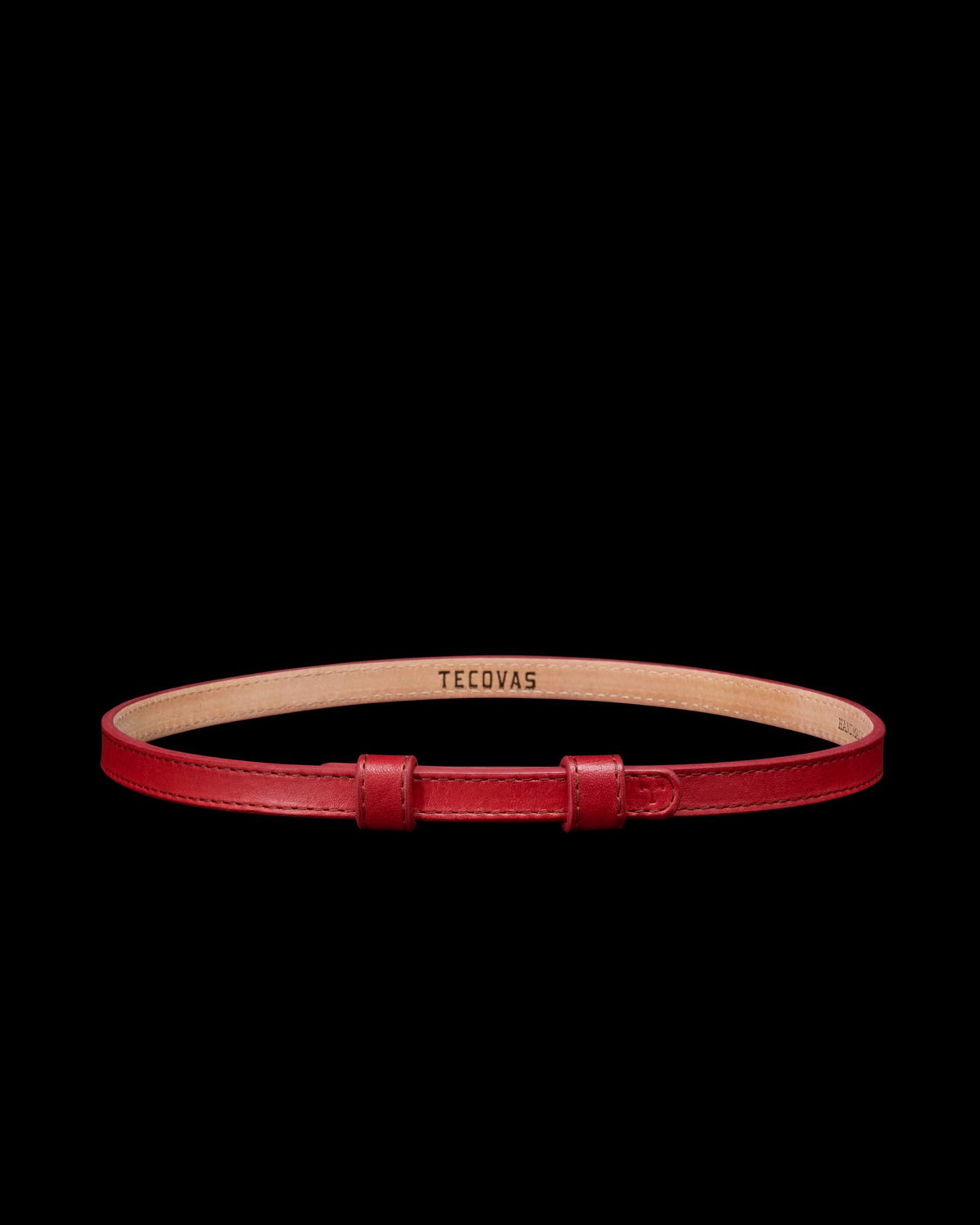 A red leather belt with a simple buckle and “Tecovas” branding on the inner side, displayed on a plain white background.