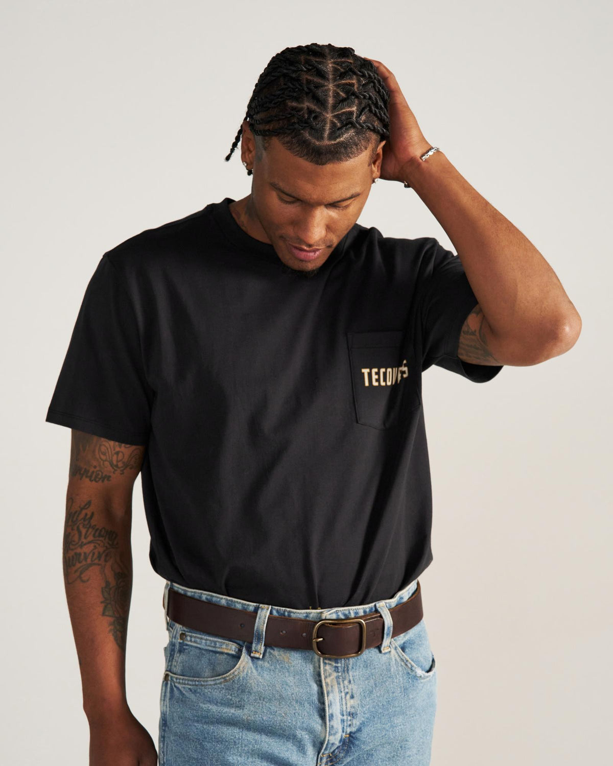 Closeup detail view of Men's the Finest Pocket T-Shirt - Black/Multi