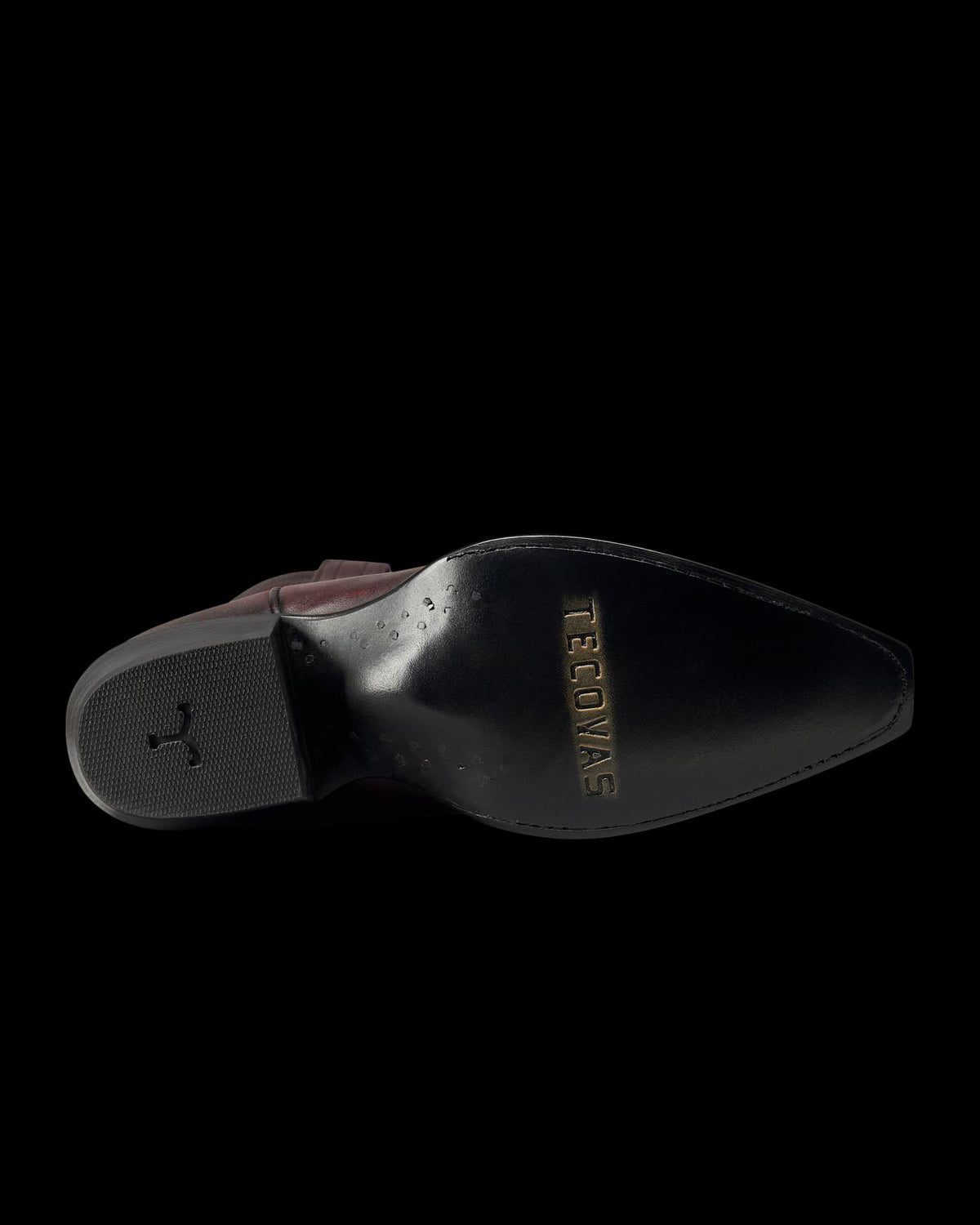 Sole view of The Annie - Black Cherry Cowhide on plain background