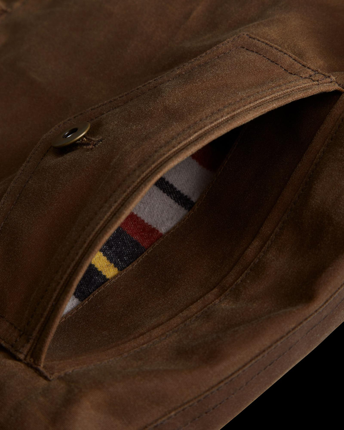 Closeup view of Buckaroo Waxed Canvas Trucker Jacket - Tobacco