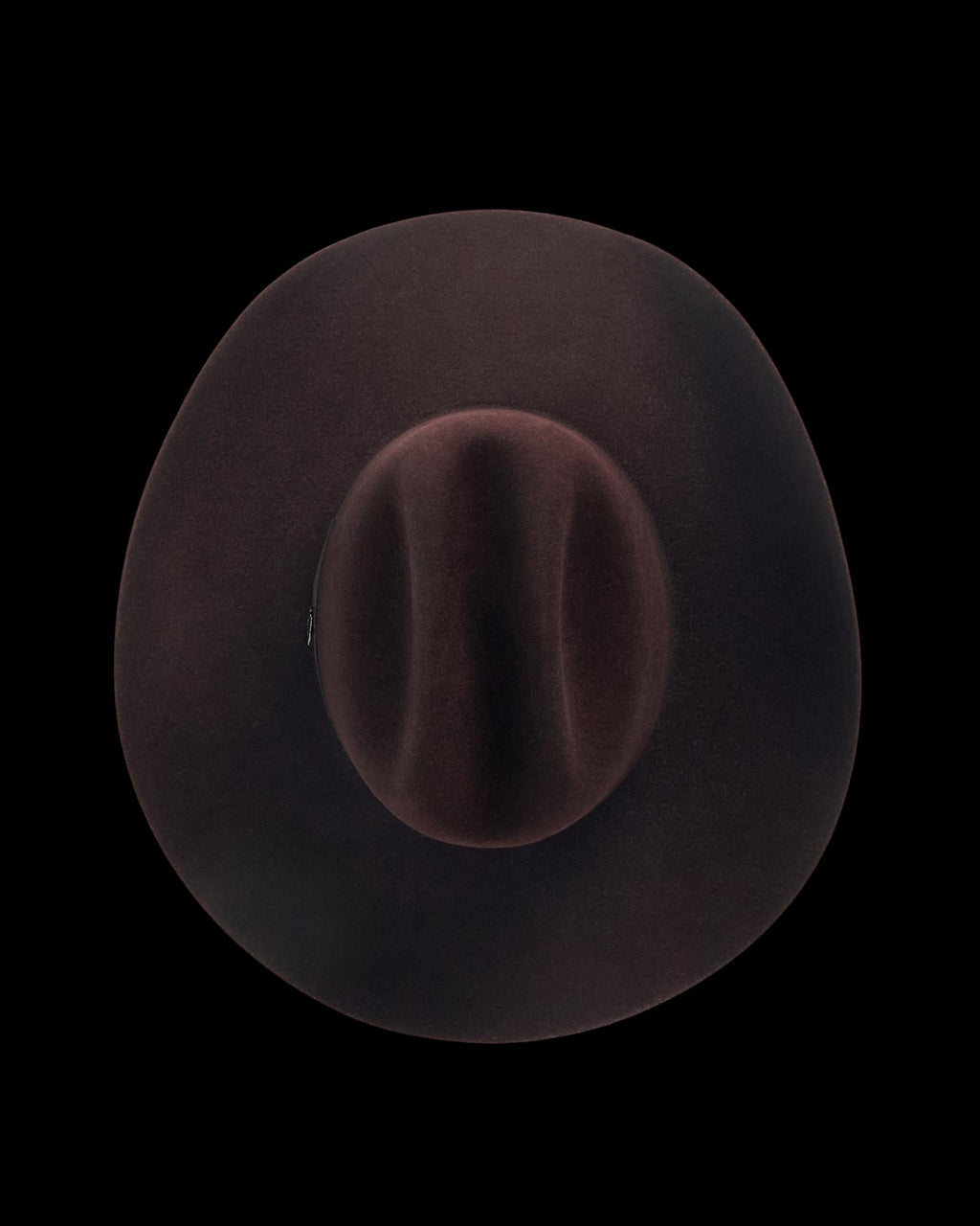 Top view of Cattleman Fur Cowboy Hat - Black Cherry on plain background