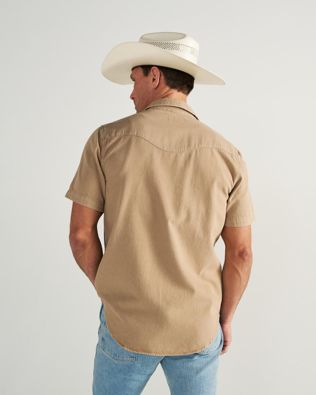 Closeup detail view of Men's Denim Short Sleeve Pearl Snap - Coriander