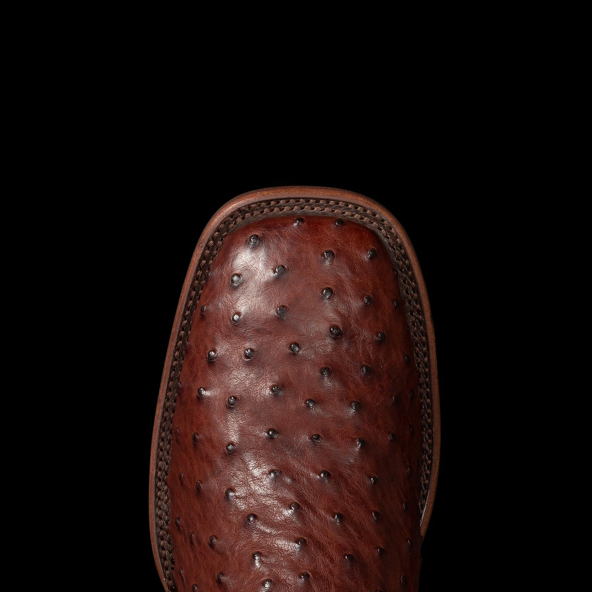 Toe view of The Emmitt - Mahogany on plain background