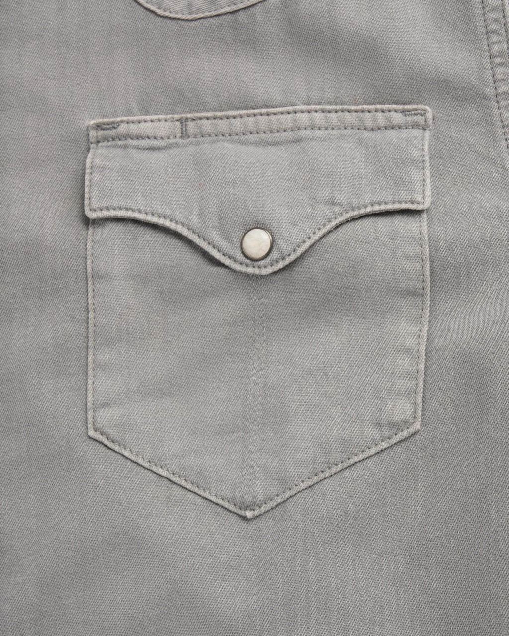 Closeup detail view of Men's Denim Pearl Snap - Light Gray