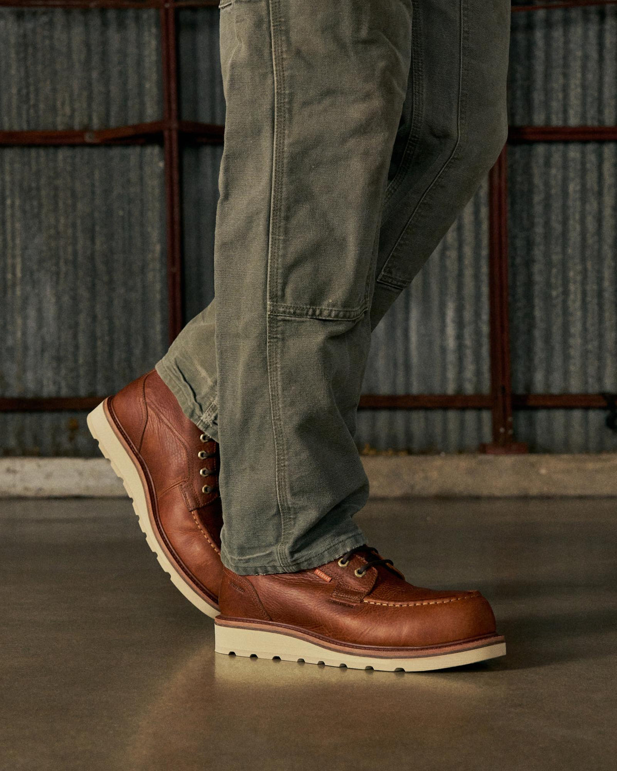 Toe view of The LH WP Moc Comp Toe Work Boot - Saddle Cowhide on plain background