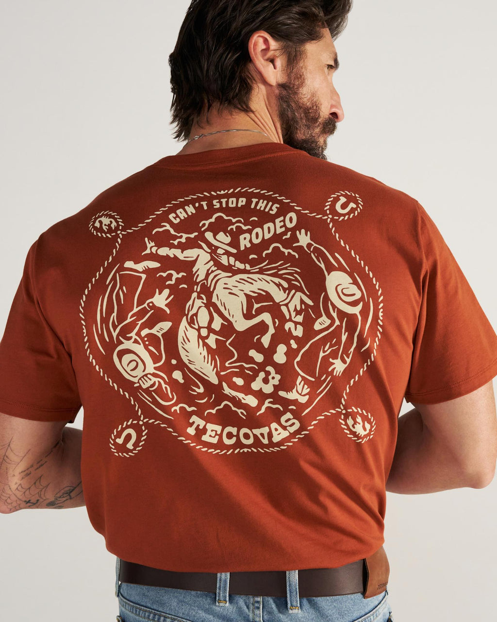 Closeup detail view of Men's Can't Stop Pocket T-Shirt - Orange Rust/Bone