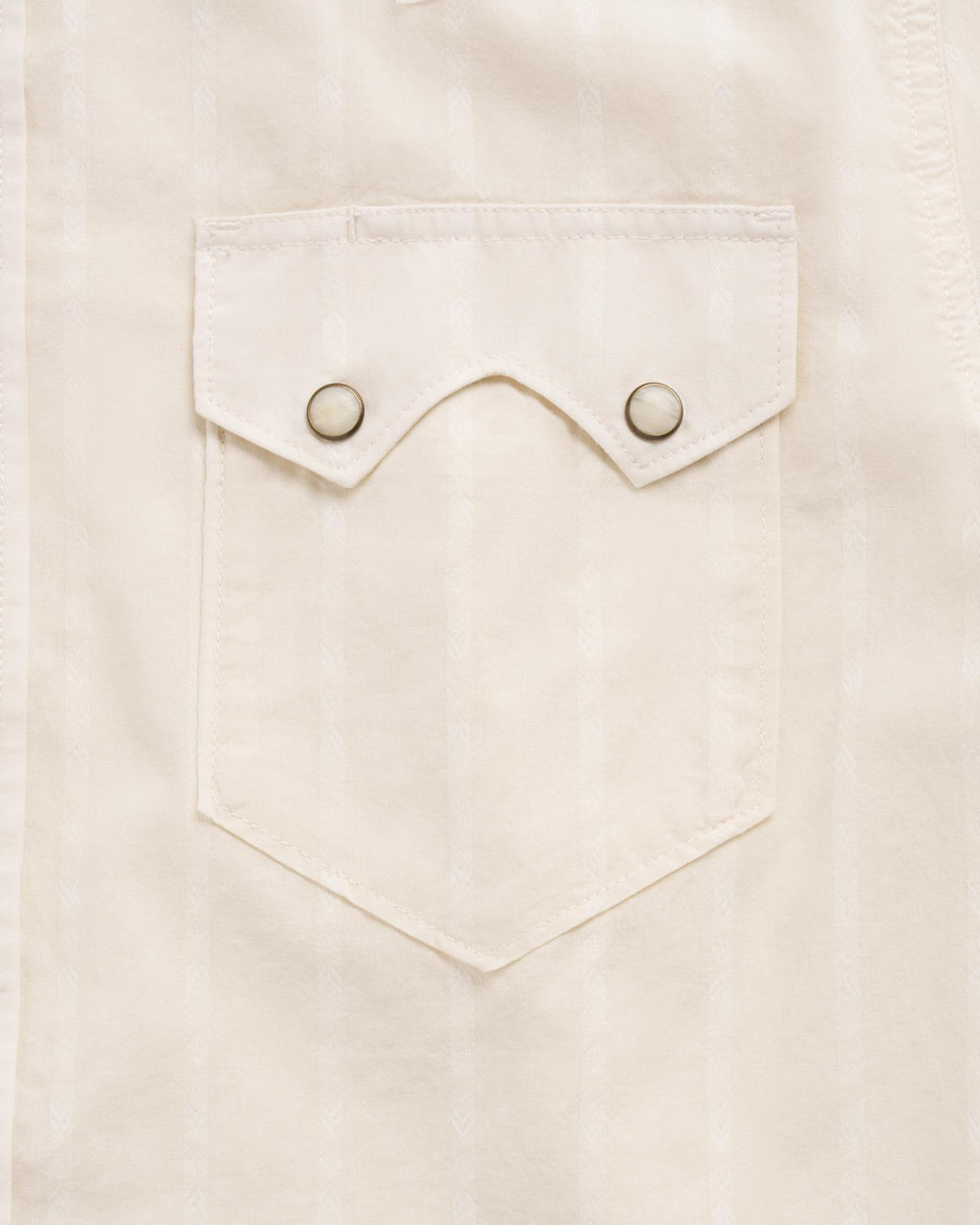 Closeup detail view of Men's Vintage Weight Short Sleeve Pearl Snap - Light Sand/Multi