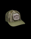Quarterfront view of Tecovas x Mossy Oak Bottomlands Trucker - MO Original Bottomland on plain background