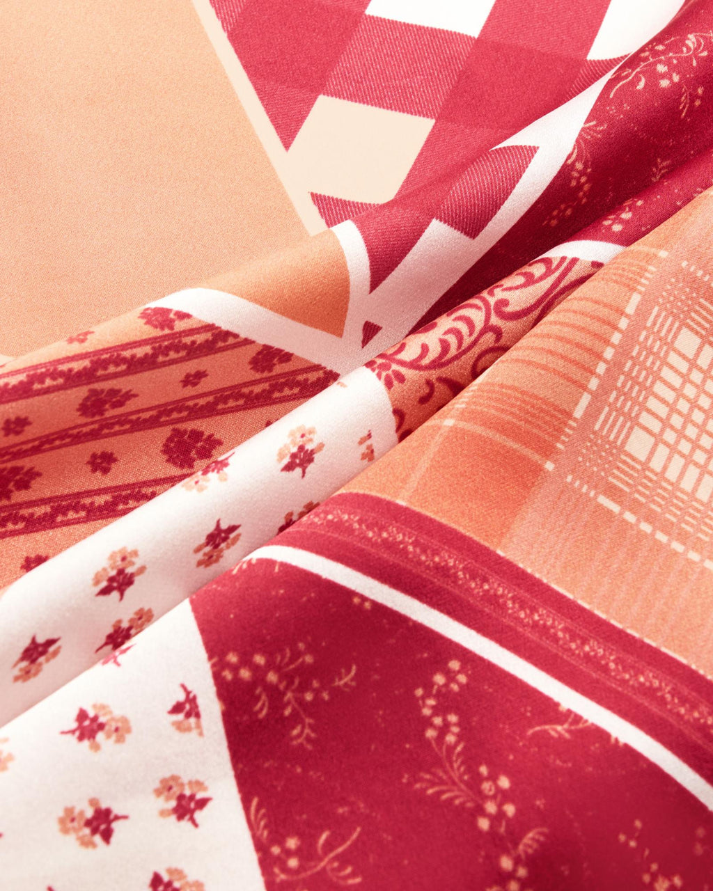 Closeup view of Patchwork Wild Rag - Red / Cream