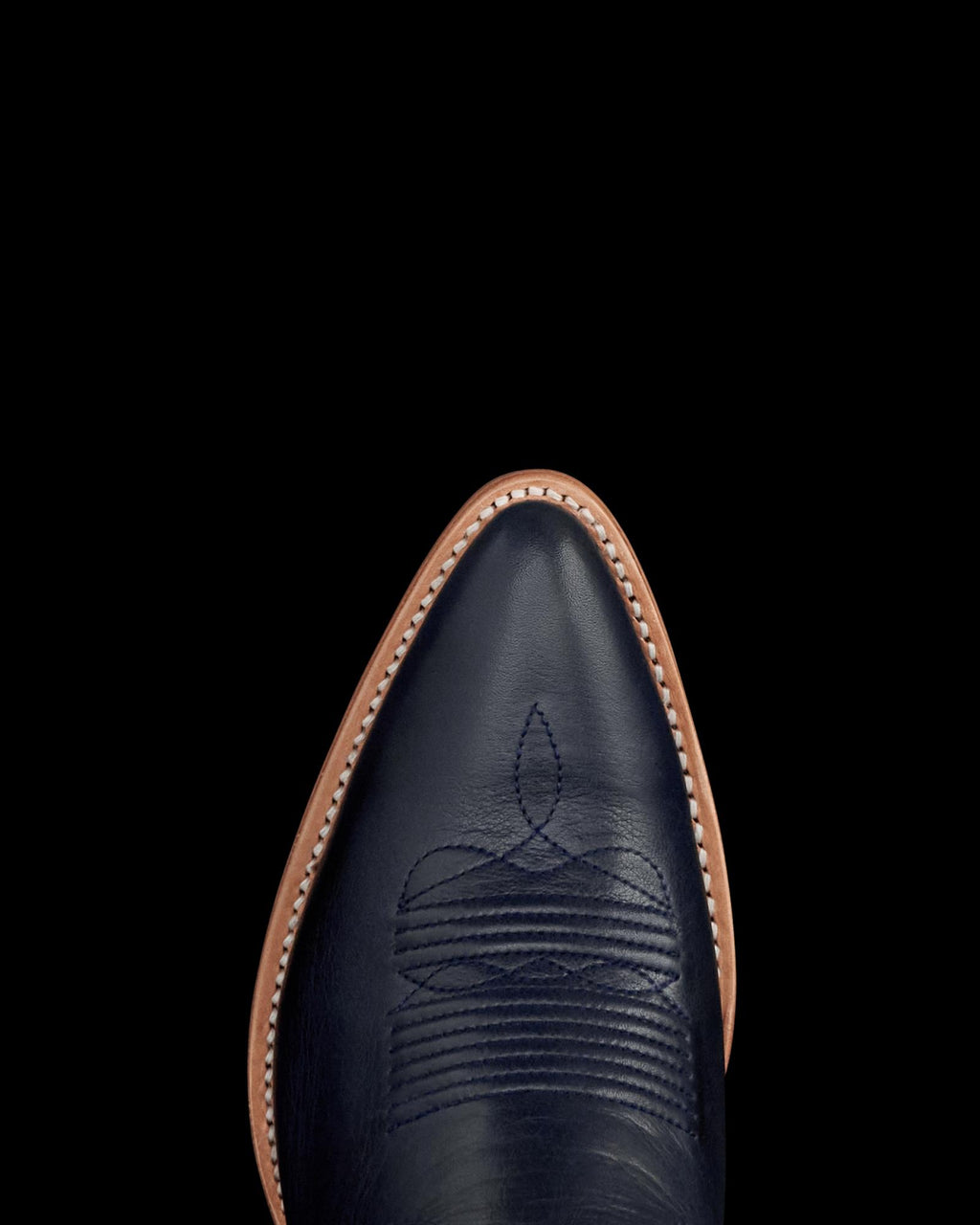 Toe view of The Jolene - Atlantic Blue/Chambray Cowhide on plain background