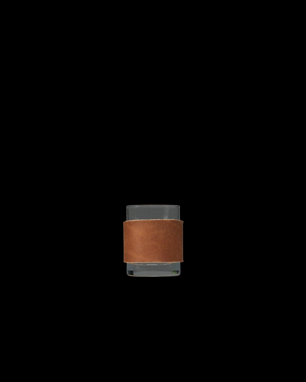 Front view of Leather Tasting Glass - Brown on plain background
