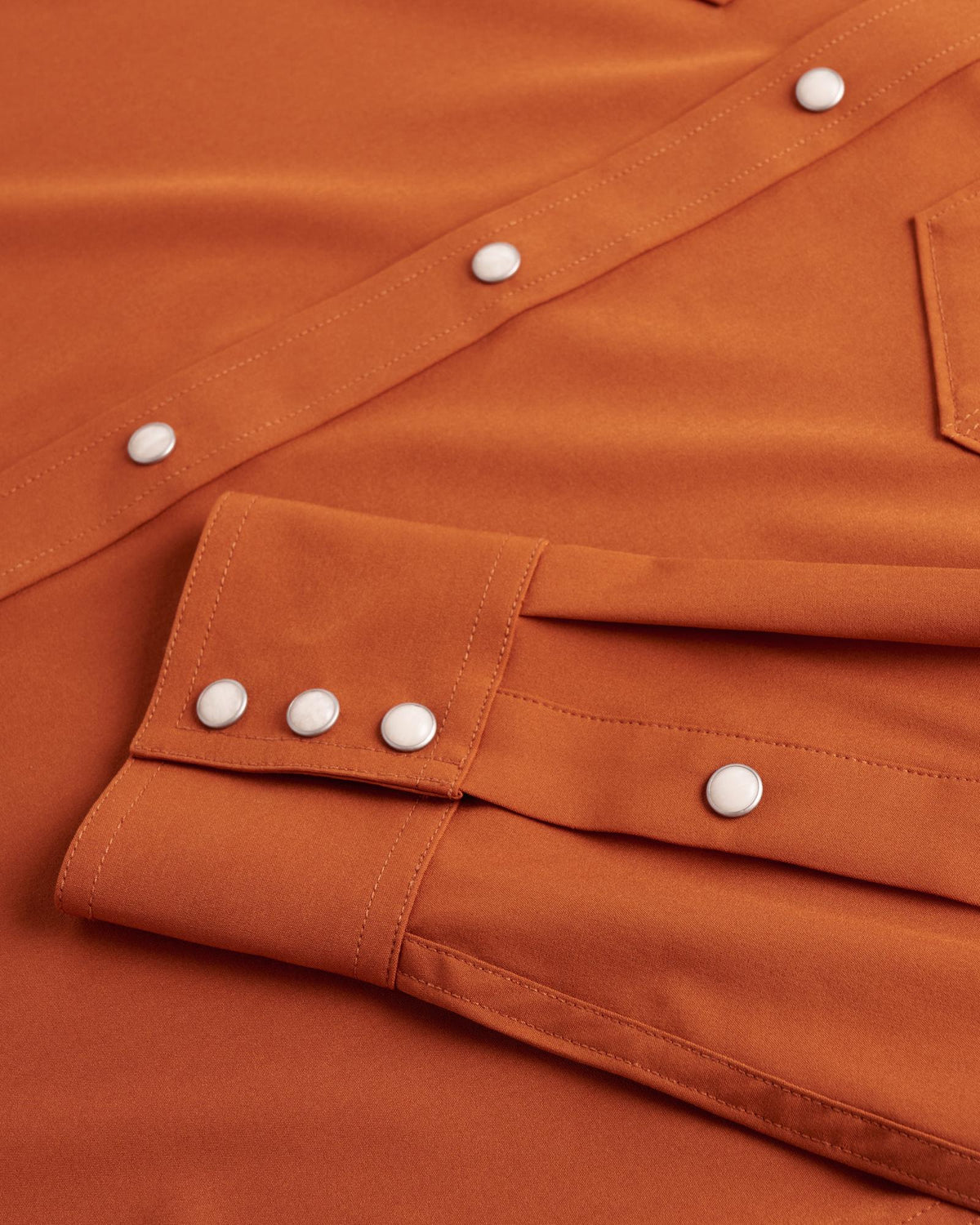 Closeup detail view of Men's Performance Western Pearl Snap - Burnt Orange