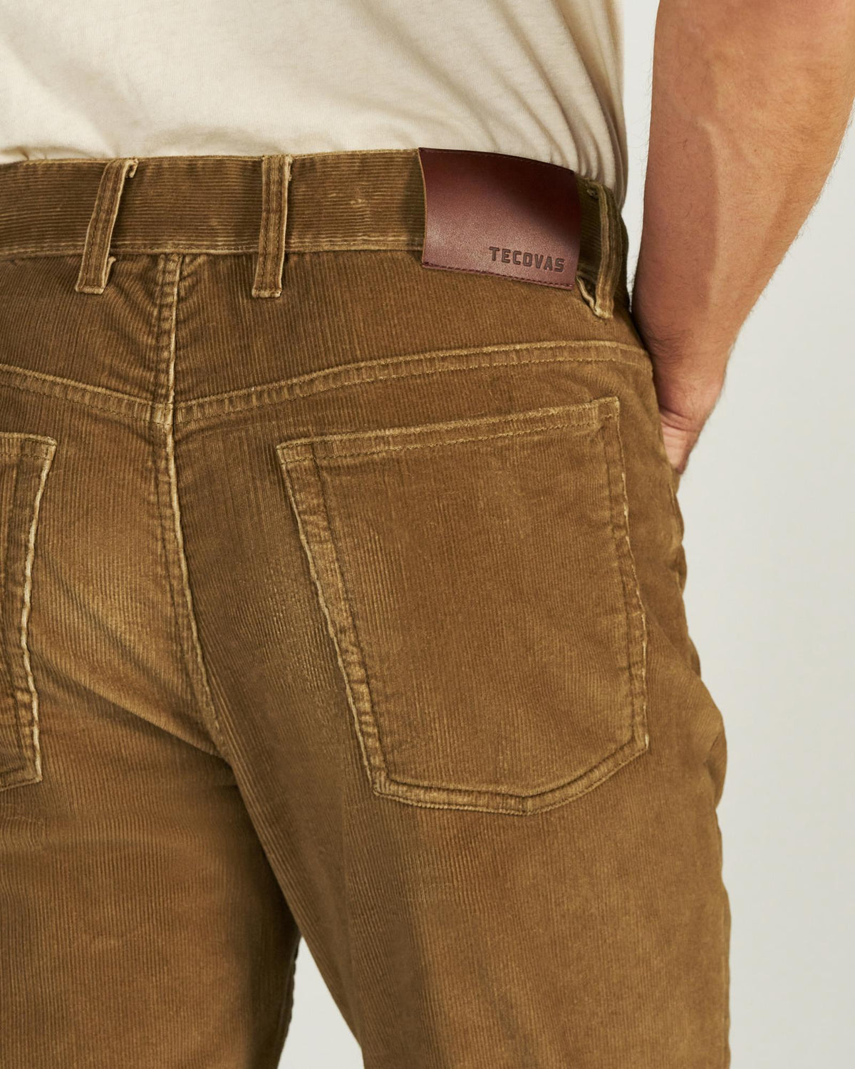 Back view of Men's Slim Straight Stretch Corduroy - Olivewood on model