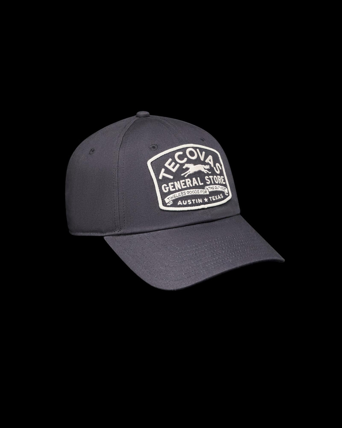 Quarterfront view of General Store Dad Hat - Washed Navy on plain background