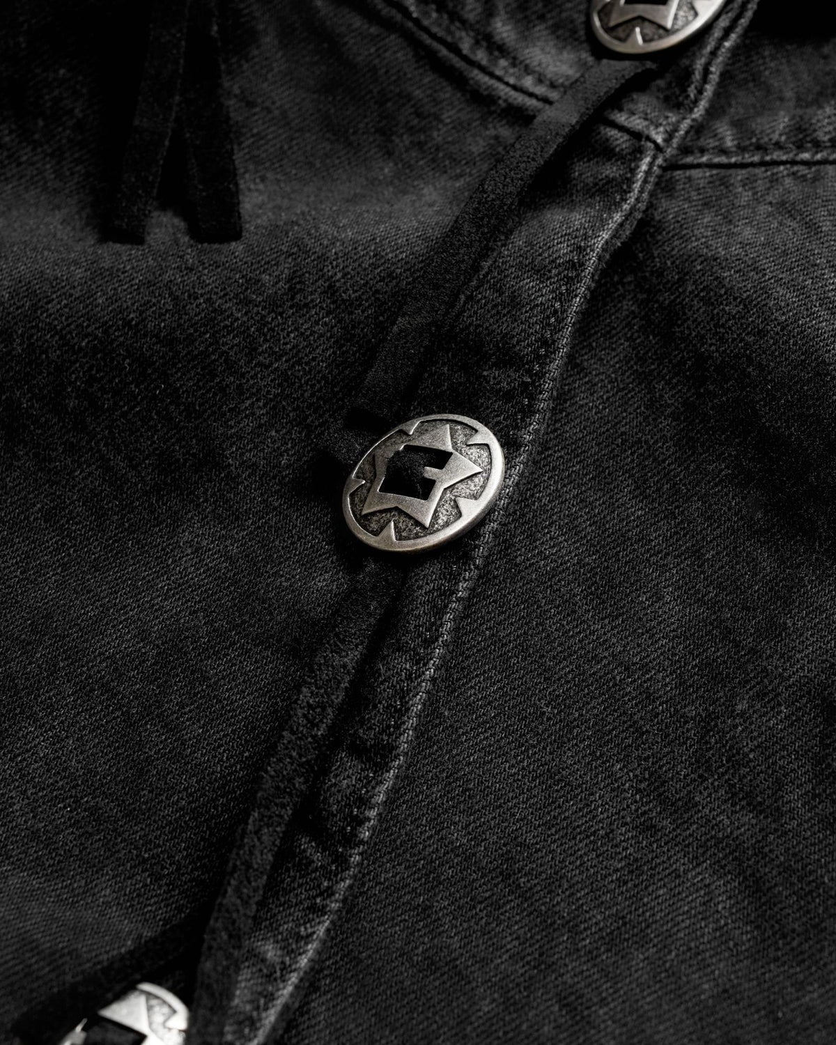 Closeup view of Women's Rodeo Concho Denim Jacket - Black