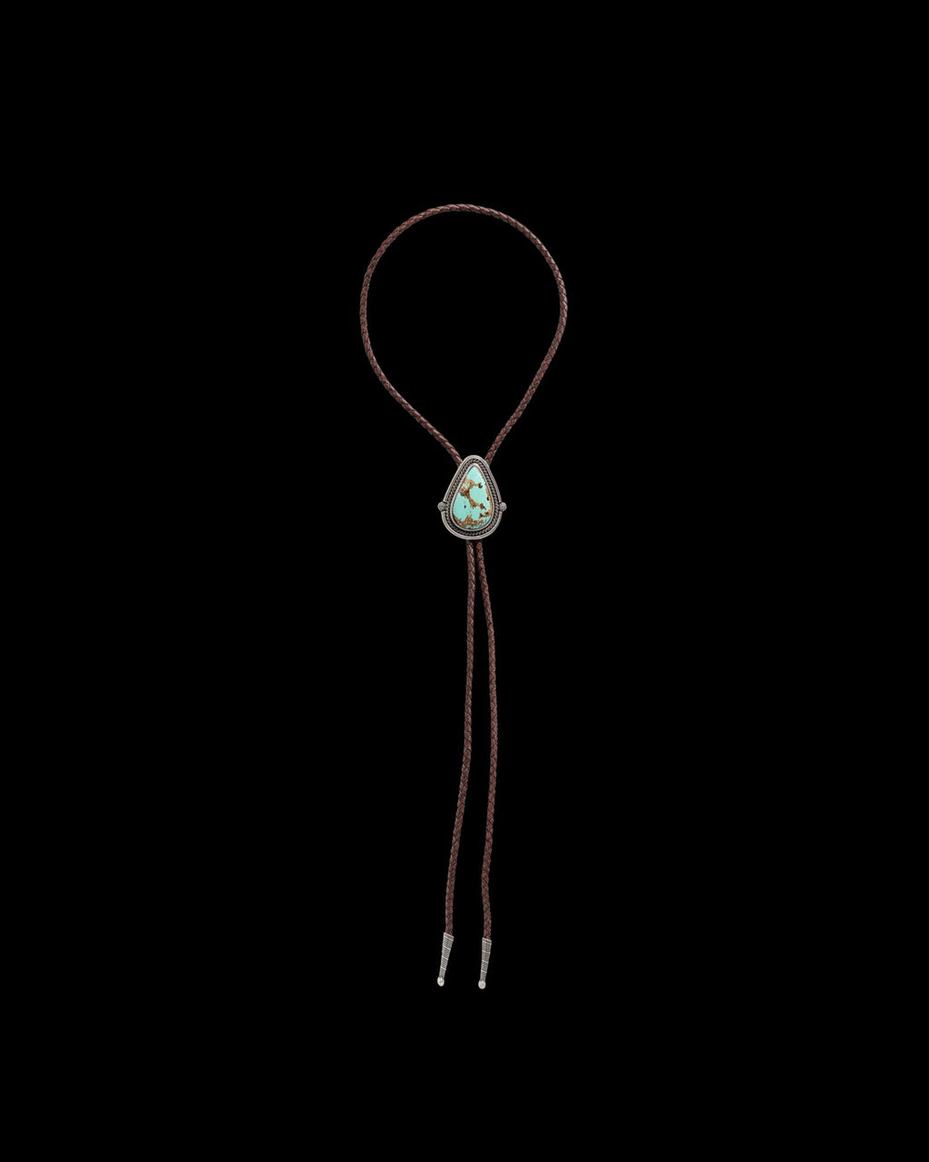 Front view of Iron Lamb Turquoise Drop Bolo - Turquoise/Brown on plain background