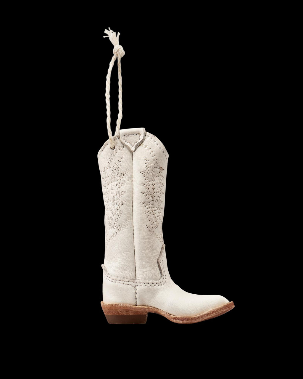 Profile view of Abby Boot Ornament - Snow on plain background
