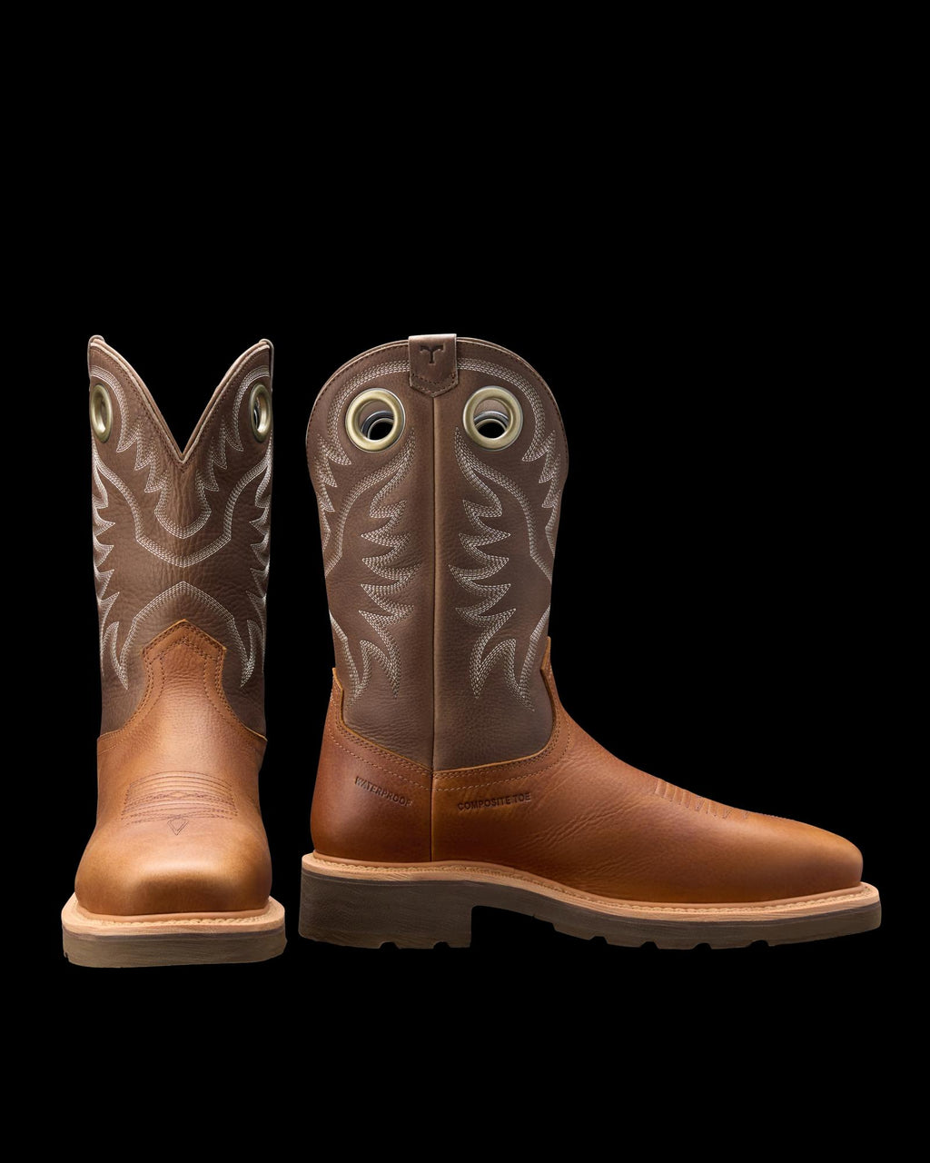 A pair of cowboy boots with brown leather uppers, intricate stitching, and durable soles.