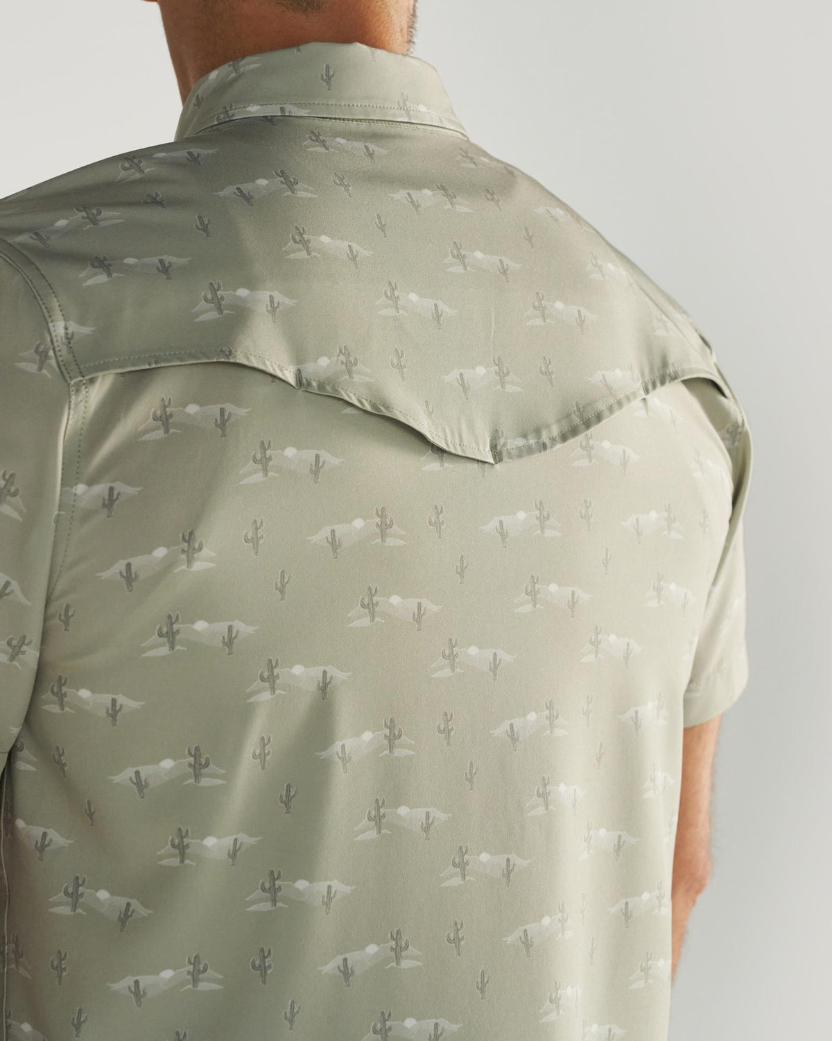 Closeup detail view of Men's Performance Western Short Sleeve Pearl Snap - Desert Sage/Light Sand