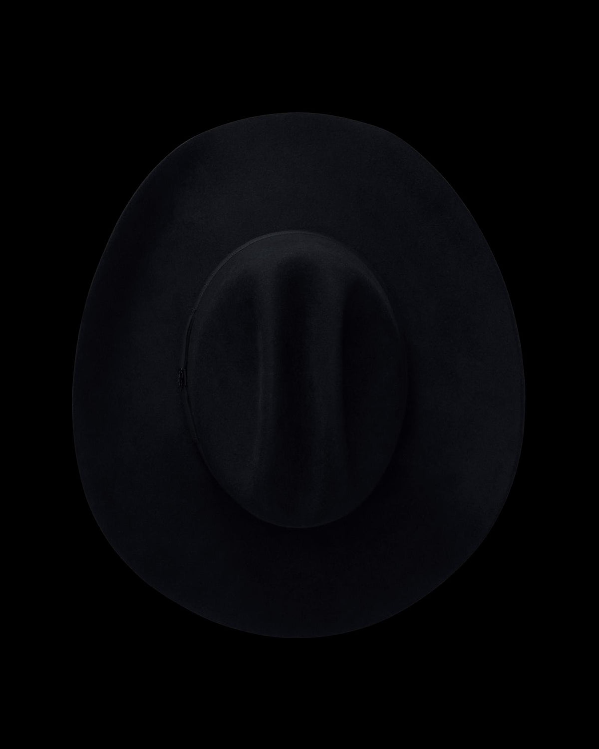 Top view of Cattleman Fur Cowboy Hat - Black on plain background