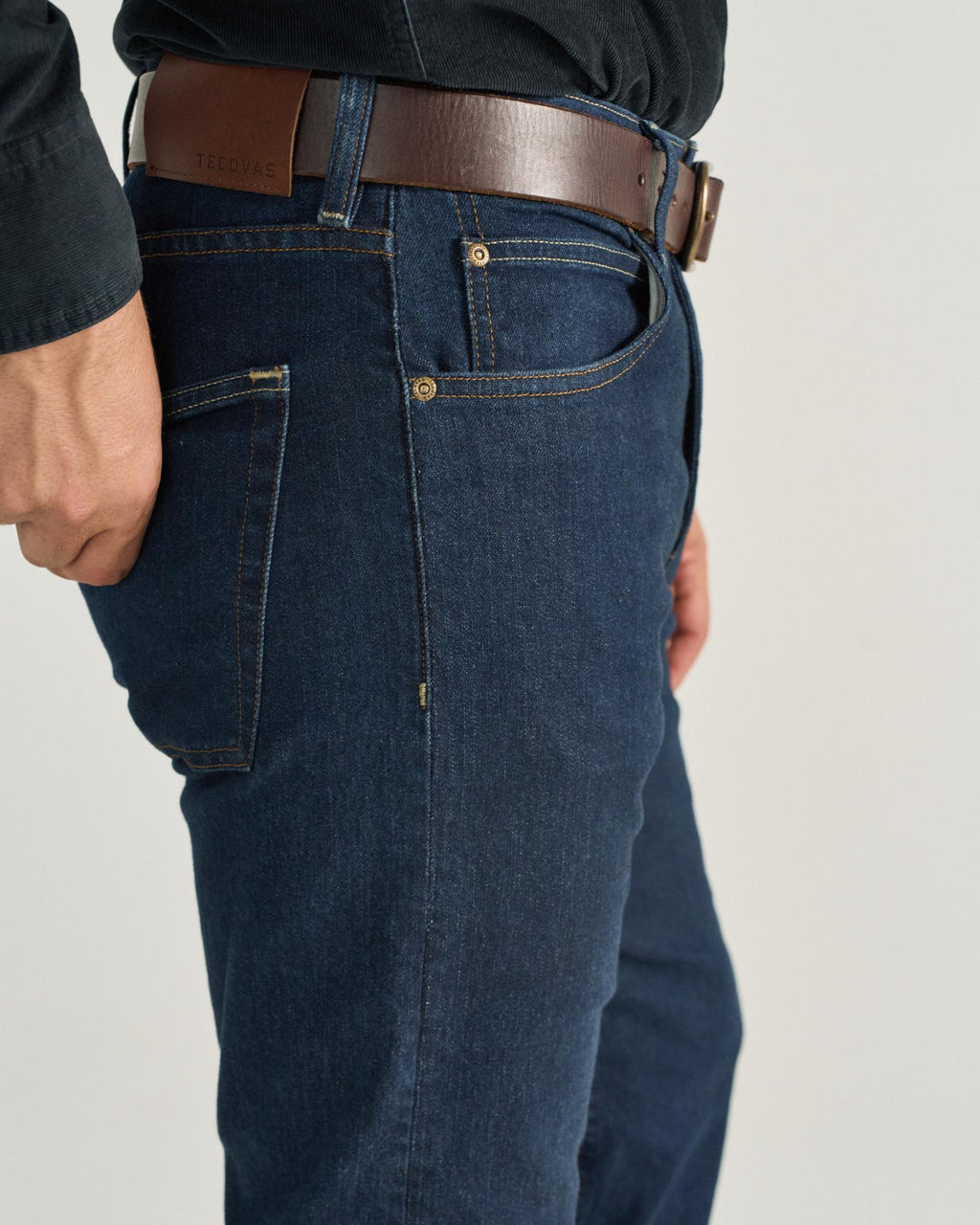 Front view of Men's Slim Straight Stretch Denim - Dark Indigo on model