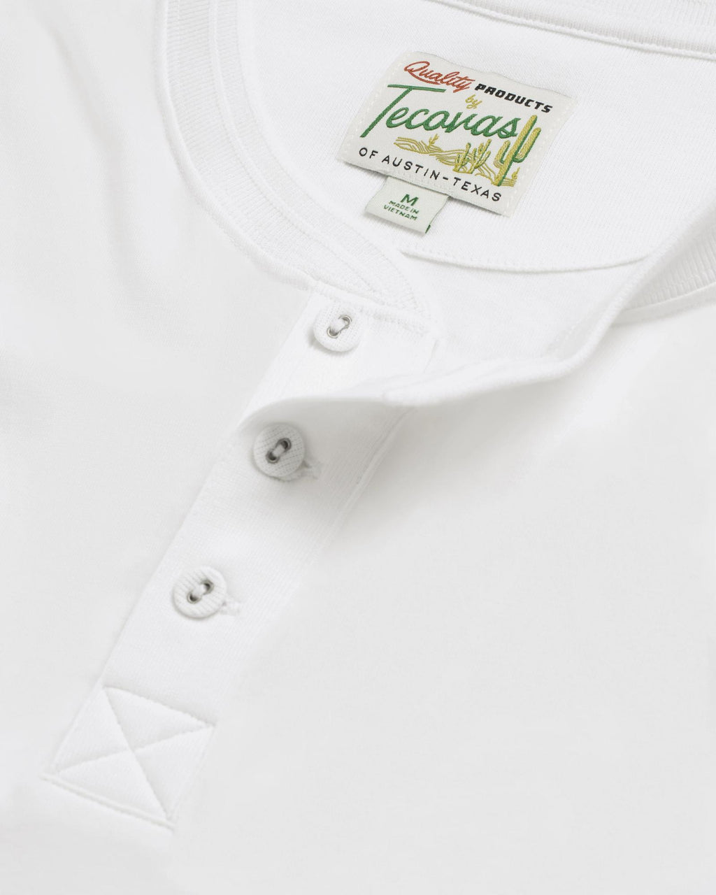 Closeup of the men's short sleeve henley in white