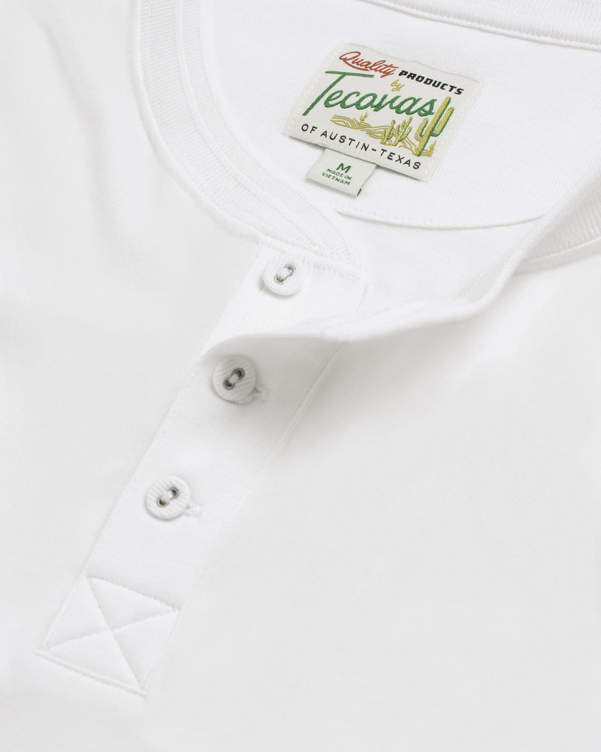 Closeup of the men's short sleeve henley in white
