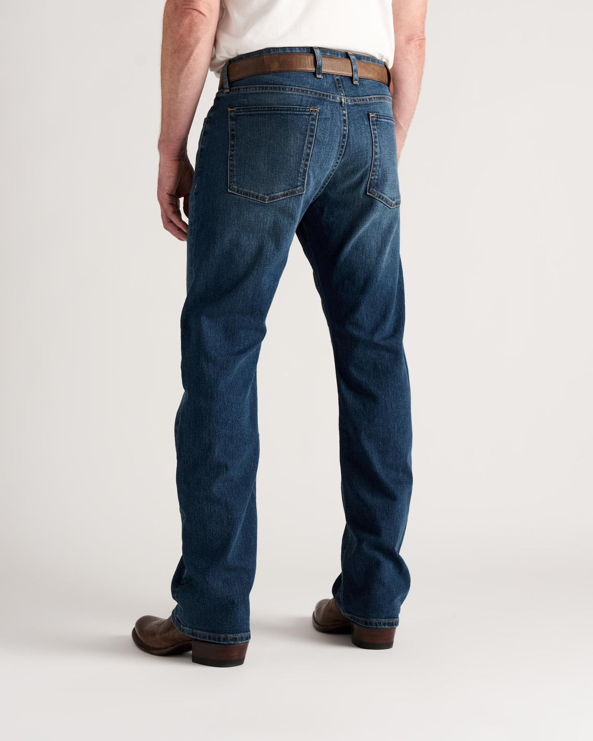 Back view of Men's Straight Stretch Denim - Medium Dark on model