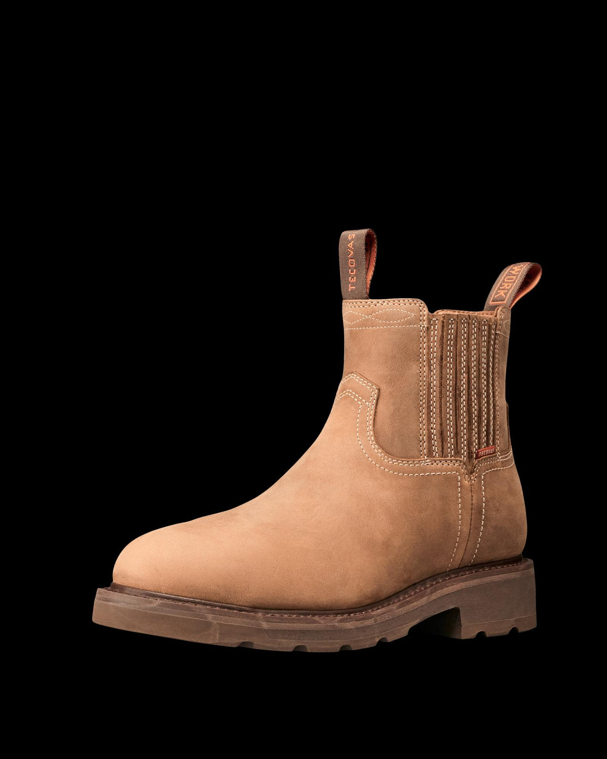 Quarterfront view of Women's LongHaul Waterproof Chelsea Composite Toe Work Boot - Heritage Tan Cowhide on plain background