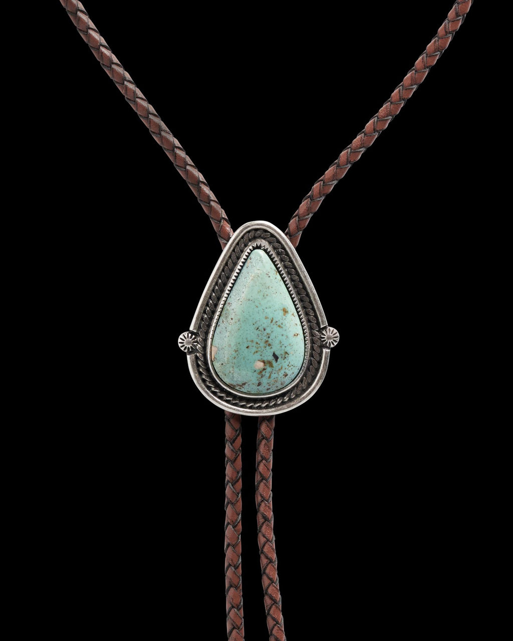 Closeup detail view of Iron Lamb Turquoise Drop Bolo - Turquoise/Brown