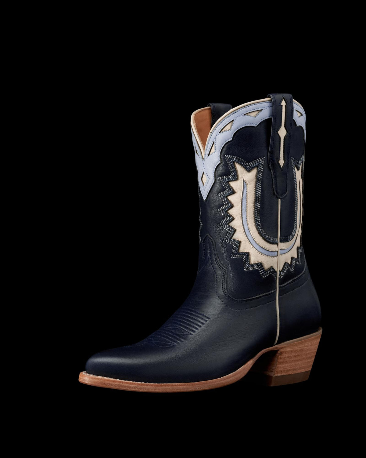 Quarterfront view of The Jolene - Atlantic Blue/Chambray Cowhide on plain background