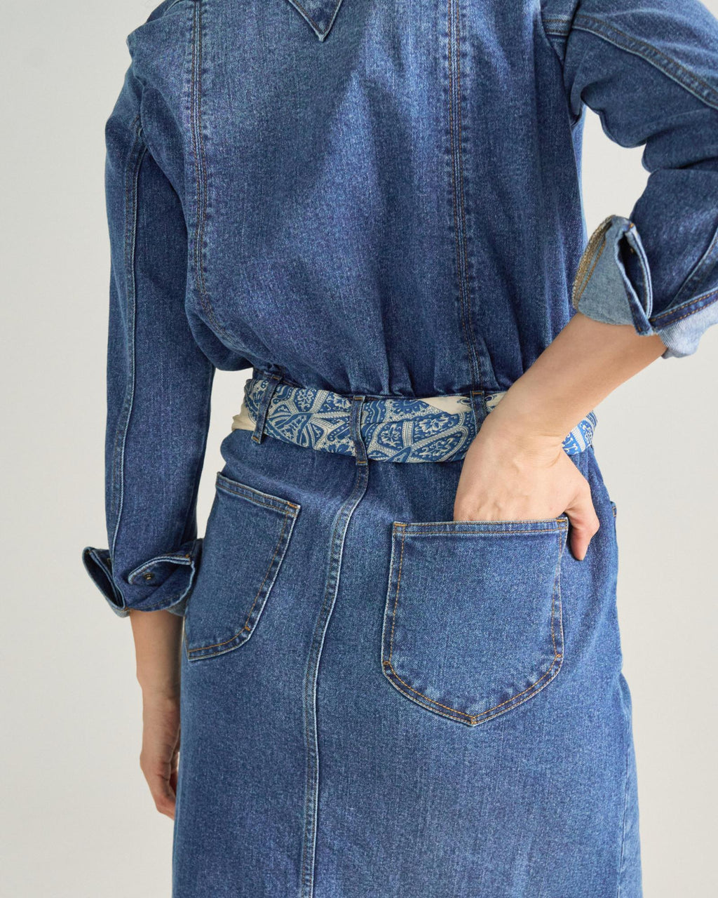 Back view of Women's L/S Denim Midi Dress - Medium Wash on model