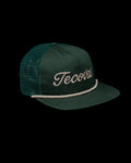 Quarterfront view of Tecovas Flat Brim Trucker - Dark Green on plain background