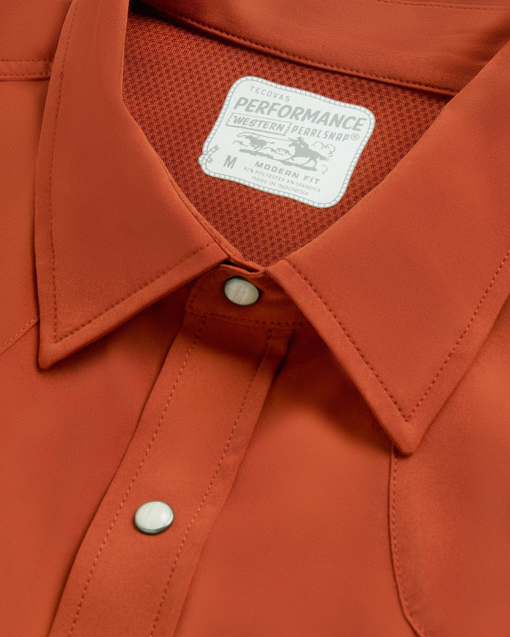 Closeup detail view of Men's Performance Western Pearl Snap SS - Orange Rust